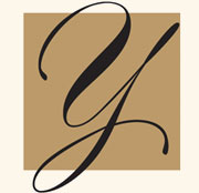 A stylized, black cursive letter "Y" centered on a tan square background.